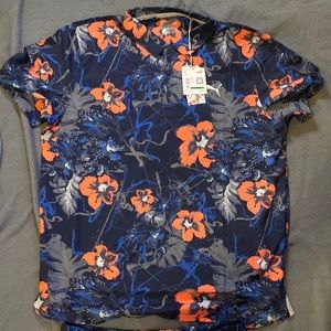 Brand new Puma golfing polo with shorts